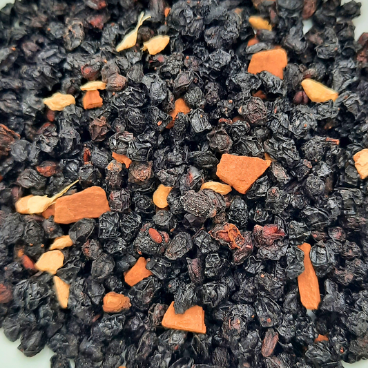 Elderberry tea made with cinnamon, clove, ginger, and elderberries.